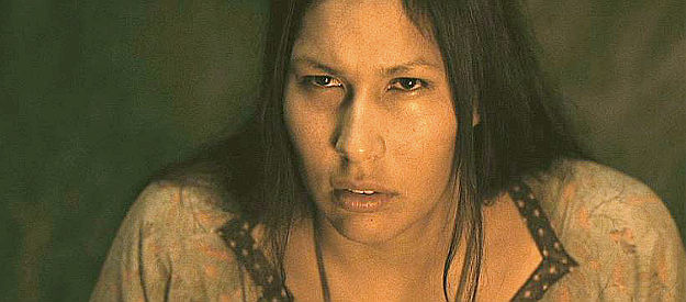 Alexandra Edmo as Faith, an Indian woman who has lost her family to the burrowers in The Burrowers (2008)