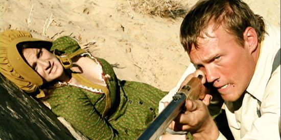 Alvin Cowan as Capt. Bugle trying to defend Patricia (Katy Maloney) as the Black Claw attack in Cowboys and Indians (2011)