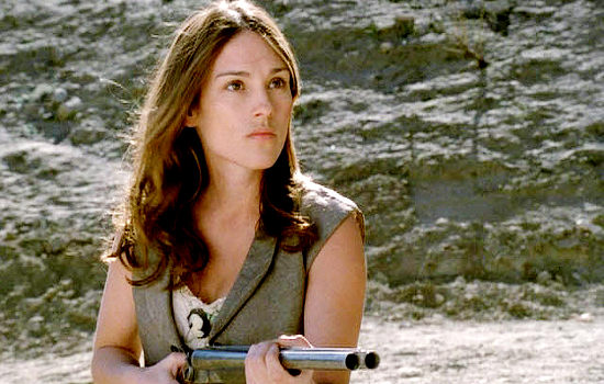 Amy Jo Johnson as Elizabeth Kennedy, insisting on riding along with McKay and Hutchinson in Hard Ground (2003)