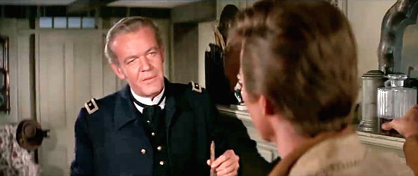 Andrew Duggan as Gen. Frederick McCabe talks Indians and strategy with scout Sol Rogers in The Glory Guys (1965)