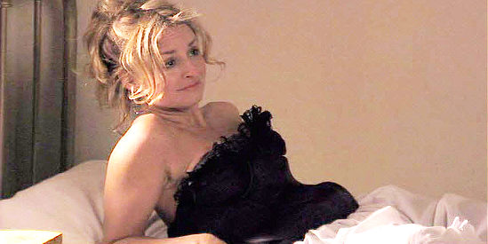 Ann Handegan as Dixie Johnson, the saloon girl the marshall is sweet on in The Showdown (2009)