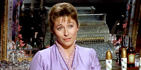 Annelle Hayes as Belle Aragon, owner of a saloon with her claws into Guthrie McCabe in Two Rode Together (1961)