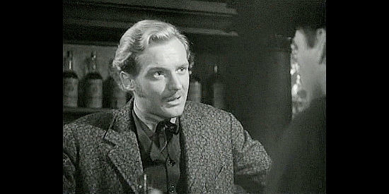 Arthur Kennedy as Ned Sharp, bracing for a showdown with Custer in They Died with Their Boots On (1941)