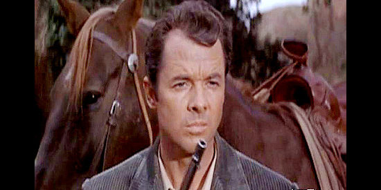 Audie Murphy as Ben Gifford, giving the option of killing a friend or blowing his cover in Gunfight at Comanche Creek (1964)