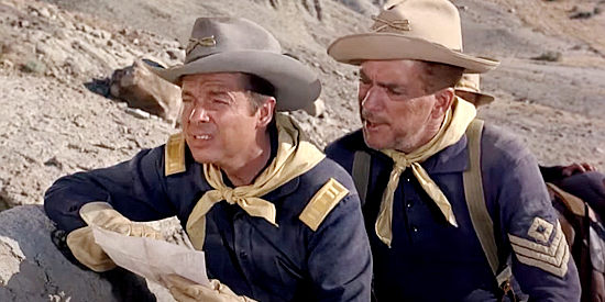 Audie Murphy as Capt. Coburn and Robert Brubaker as Sgt. Walker, plotting strategy in 40 Guns to Apache Pass (1967)