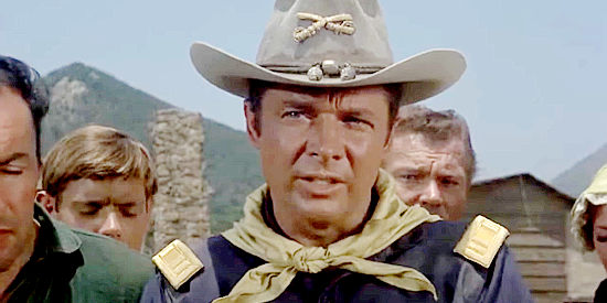 Audie Murphy as Capt. Coburn, responsible for getting a badly needed supply of rifles to the cavalry outpost in 40 Guns to Apache Pass (1967)