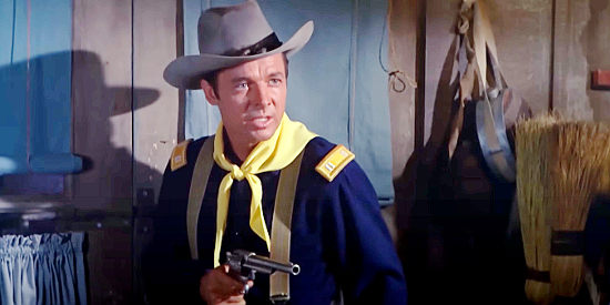 Audie Murphy as Capt. Jeff Stanton, determined to get answers about a white man's death in Apache Rifles (1964)