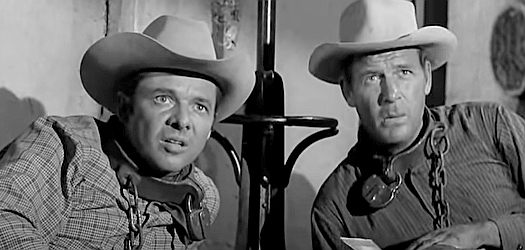 Audie Murphy as Chris Foster and Charles Drake as Bert Pickett, watching a express robbery that will get them into deeper trouble in Showdown (1963)