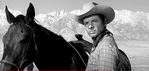 Audie Murphy as Chris Foster, trying to bail a friend out of a jam in Showdown (1963)
