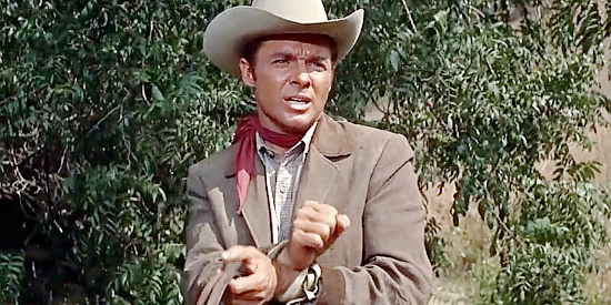 Audie Murphy as Clay Santell, demanding that Marshal Deckett set him free in Hell Bent for Leather (1960)