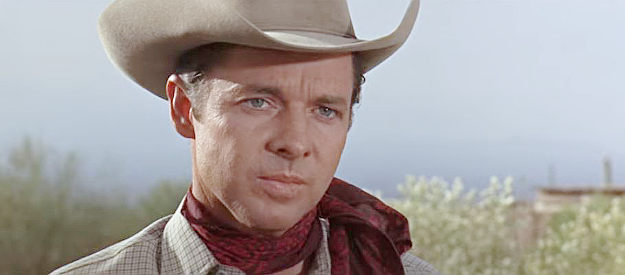 Audie Murphy as Clint Stewart, a man who has to help track down his former friends to stay out of prison in Arizona Raiders (1965)