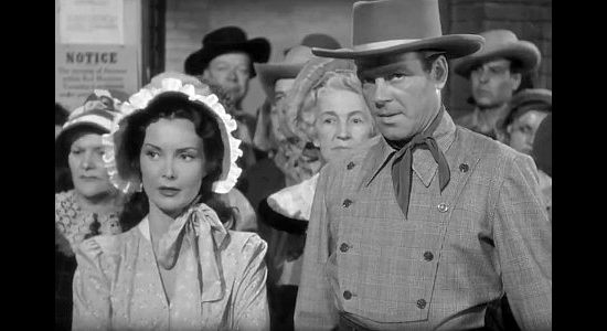 Audrey Young as Juanita Hawkins wondering when Jim SImpson (William Ching) will start using his six-gun in The Wistful Widow of Wagon Gap (1947)
