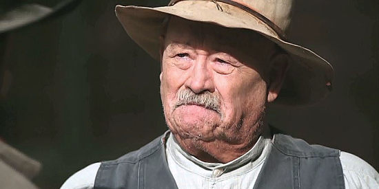Barry Corbin as Jake Rawlins, the man who took in Wes Rawlins' mom and helped raise him in Shadow on the Mesa (2013)