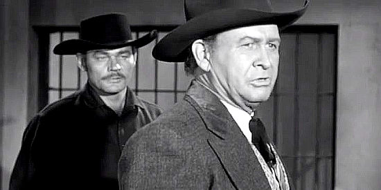 Barton MacLane as Carl Avery with Link Roy (Leo Gordon), his fast gun for hire in Noose for a Gunman (1960)