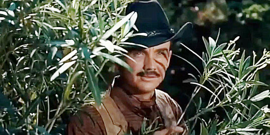Ben Cooper as Deputy Rink, snooping on Johnny and his companions in The Fastest Guitar Alive (1967)