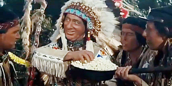 Ben Lessy as the Indian chief whose braves keep harassing the traveling medicine show in The Fastest Guitar Alive (1967)