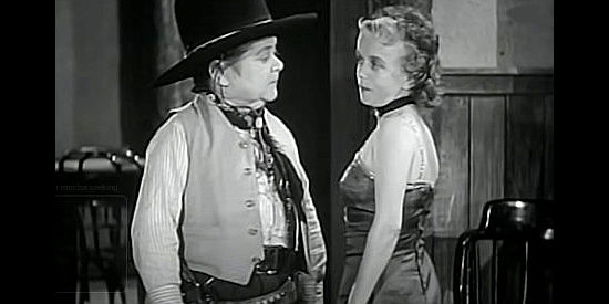 Billy Rhodes as Bat Haines and Nita Krebs as Nita, having a falling out in The Terror of Tiny Town (1938)