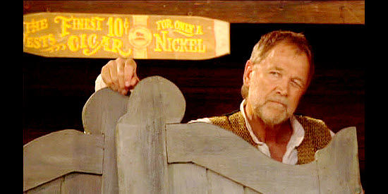 Bo Svenson as saloon owner Del Shannon in Hell to Pay (2006)
