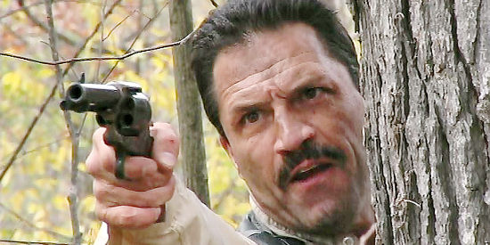 Bob Handegan as Marshal Luke Canfield, in a gunfight with horse thieves in The Showdown (2009)