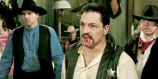 Bob Handegan as Marshal Luke Canfield, showing the effects of a brawl with Asa Brown in The Showdown (2009)