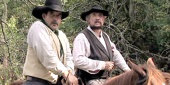 Bob Krouse as Calvert Brown and William Homel as Asa Brown, watching their brother being taken to jail in The Showdown (2009)