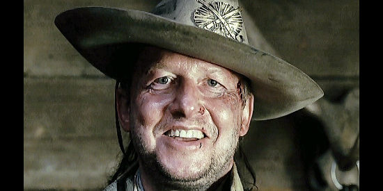 Boguslaw Linda as The Sheriff, ready to meet The Woman in Dead Man's Bounty (2006)
