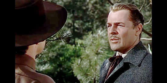 Brian Donlevy as George Camrose, constantly gambling his money away in Canyon Passage (1946)