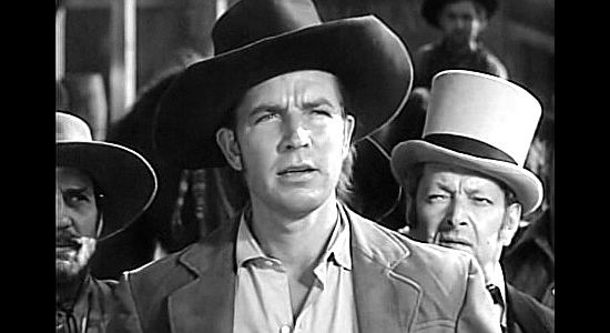 Bruce Cabot as Bill Warren, defending Murietta's actions as the sheriff tries to round up a posse in Robin Hood of El Dorado (1936)