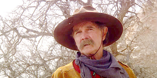 Buck Taylor as Buckskin Charlie, one of the stage line employees in Miracle at Sage Creek (2005)
