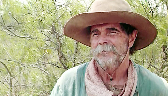 Buck Taylor as Pap Doolin, the cattleman who hires on Jericho and Joshua in Jericho (2000)