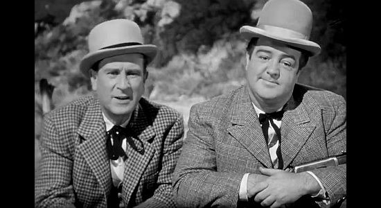 Bud Abbott as Duke Egan and Lou Costello as Chester Wooley, California-bound businessmen stuck in Wagon Gap in The Wistful Widow of Wagon Gap (1947)