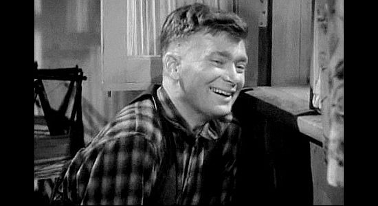 Buddy Ebsen as 'Snifty' Edwards, playing a joke on 'Wild Bill' Malone in The Kid from Texas (1939)