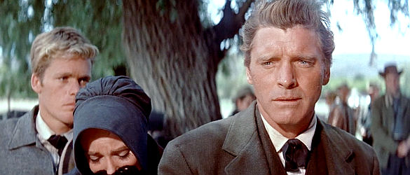 Burt Lancaster as Ben Zachary, making a promise to a grieving father in The Unforgiven (1960)