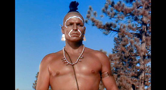 Buster Crabbe as Magua, demanding Cora Munro for his wife in Last of the Redmen (1947)