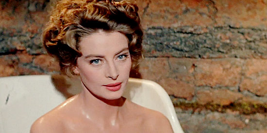 Capucine as Michelle Bonet, aka Angel, bothered by Billy's attention in North to Alaska (1960)