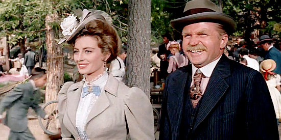 Capucine as Michelle Bonet with Karl Swenson as Lars Nordquist at the loggers' picnic in North to Alaska (1960)
