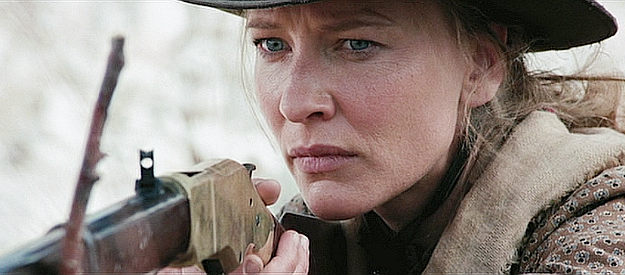 Cate Blanchett as Magdalena Gilkeson, lying in ambush for the renegades in The Missing (2003)