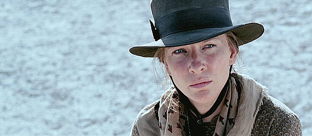 Cate Blanchett as Magdalena Gilkeson, wary of the Indian joining their party in The Missing (2003)