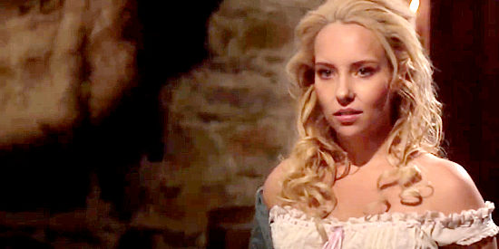 Cecille Bull as Pearle, the saloon girl Saul uses as a shield to escape the law in Heathens and Thieves (2012)