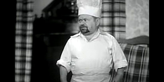 Charles Becker as Otto, cook for the Prestons, helping watch over Nancy in The Terror of Tiny Town (1938)