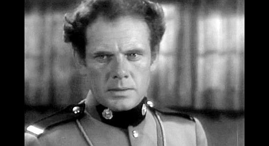 Charles Bickford as John Keith, posing as Sgt. Conniston and facing a difficult decision as a result in River's End (1930)