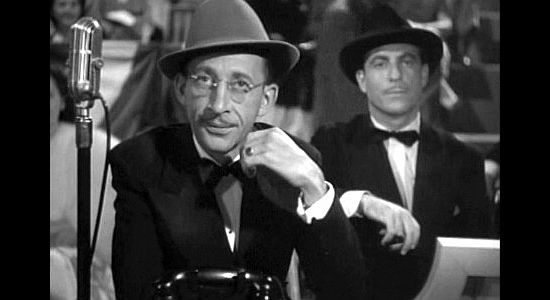 Charles Lane as Martin Manning, trying to prove Bronco Bob as a phony in Ride 'Em Cowboy (1942)