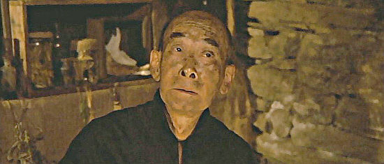 Charles Lum as the Chinese healer in Good for Nothing (2011)