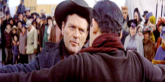 Charles McGraw as Bob Yountis, causing trouble again for Yancey and his friends in Cimarron (1960)