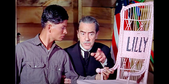 Charles Wagenheim as Milton introduces Cass Dunning (Richard Lapp) to a chair Lilly Langtree once used in A Time for Dying (1969)