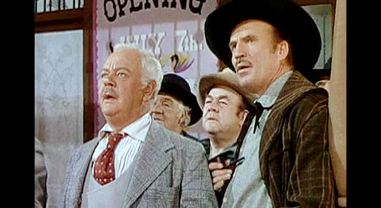 Charles Winninger as Pop Candless (left), realizing the ship carrying his new entertainers is arriving a day early in Belle of the Yukon (1944)