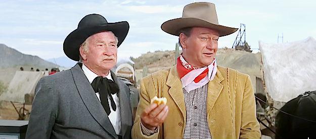 Chill Wills as Drago and John Wayne as George Washington McLintock sampling Louise Warren's cooking in McLIntock! (1963)