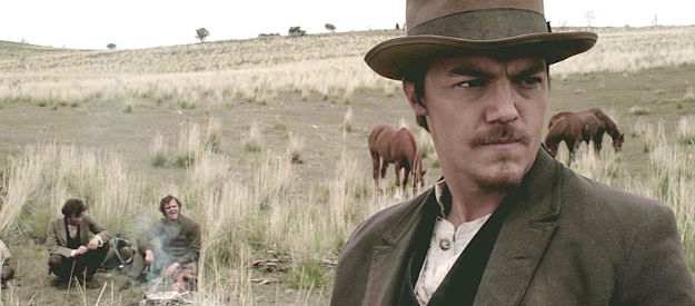 Chris Laird as Rone Clawson, the small-time outlaw who;s robbed grave prompts the investigation in Redemption for Robbing the Dead (2011)