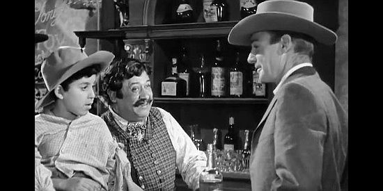 Chris-Pin Martin as Pete, bartender at the Bella Union with Pablo (Ventura Ybarra), the boy he's raising and Wyatt Earp (Randolph Scott) in Frontier Marshal (1939)