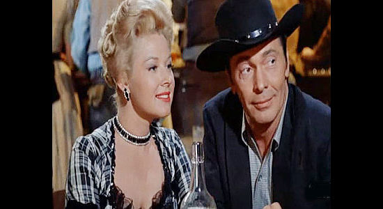 Claudia Barrett as Gilda, one of Flood's many admirers, with Jim Flood (Barry Sullivan) in Seven Ways from Sundown (1960)